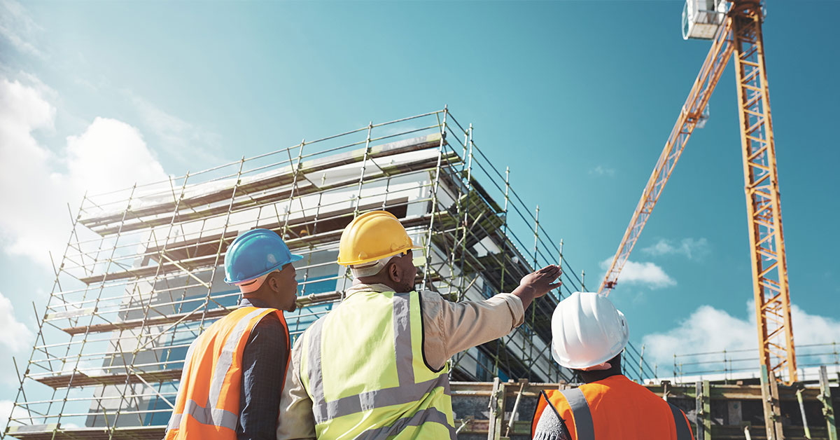 Construction engineers at a construction site of a new office building.