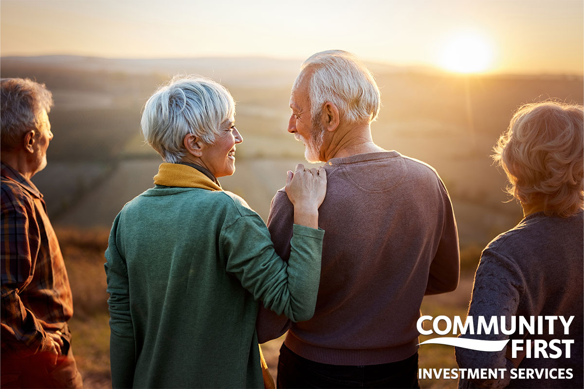 Seniors overlooking horizon
