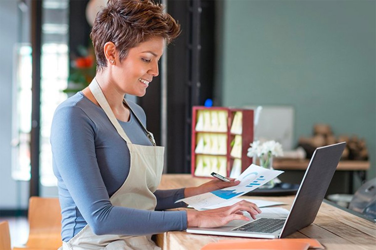 woman checking her laptop