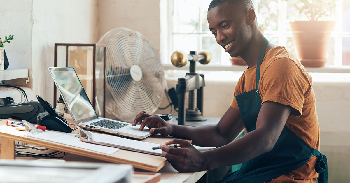 Small business owner reviewing financial documents