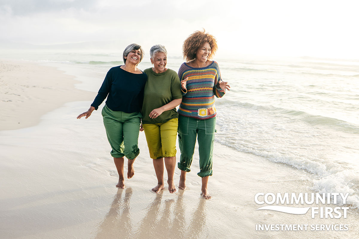 3 Women Smiling Walking the beach