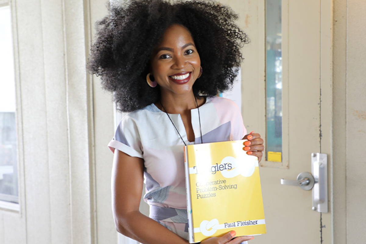 St Augustine Teacher with Award