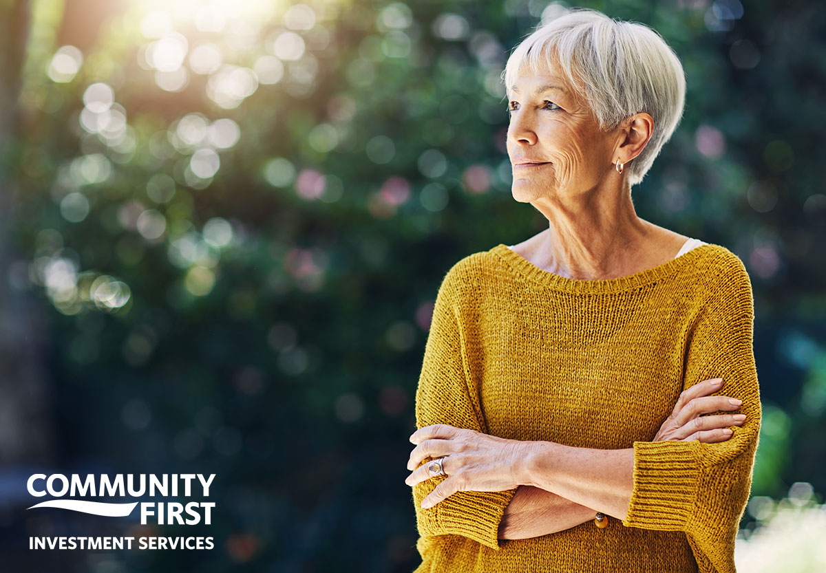 Woman Smiling with Arms Crossed