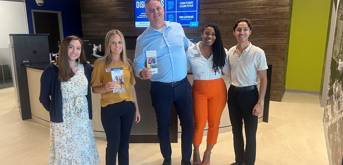 St. Augustine Youth Services Team with Brochures