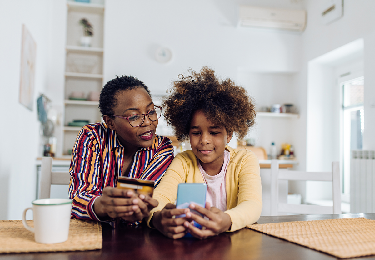 Parent and Child using cell phone together
