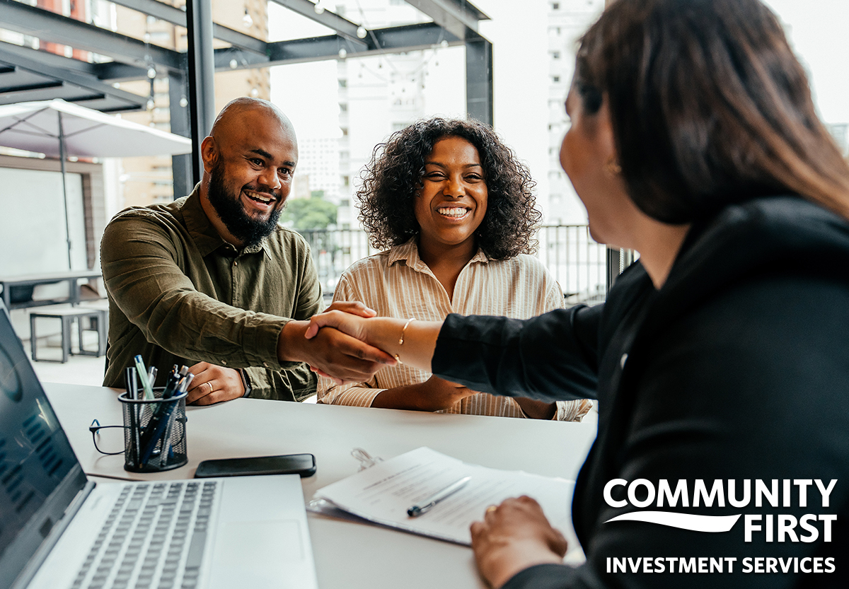Couple Shaking Hands with Advisor