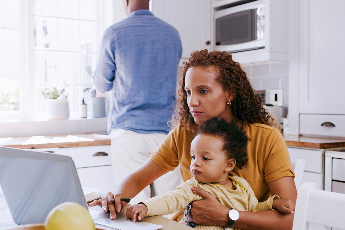 woman and child on laptop