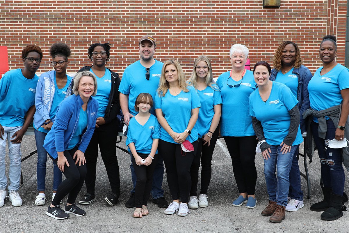 group of community first cares foundation people smiling