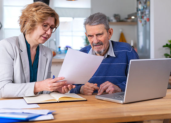 Man and woman reviewing documents