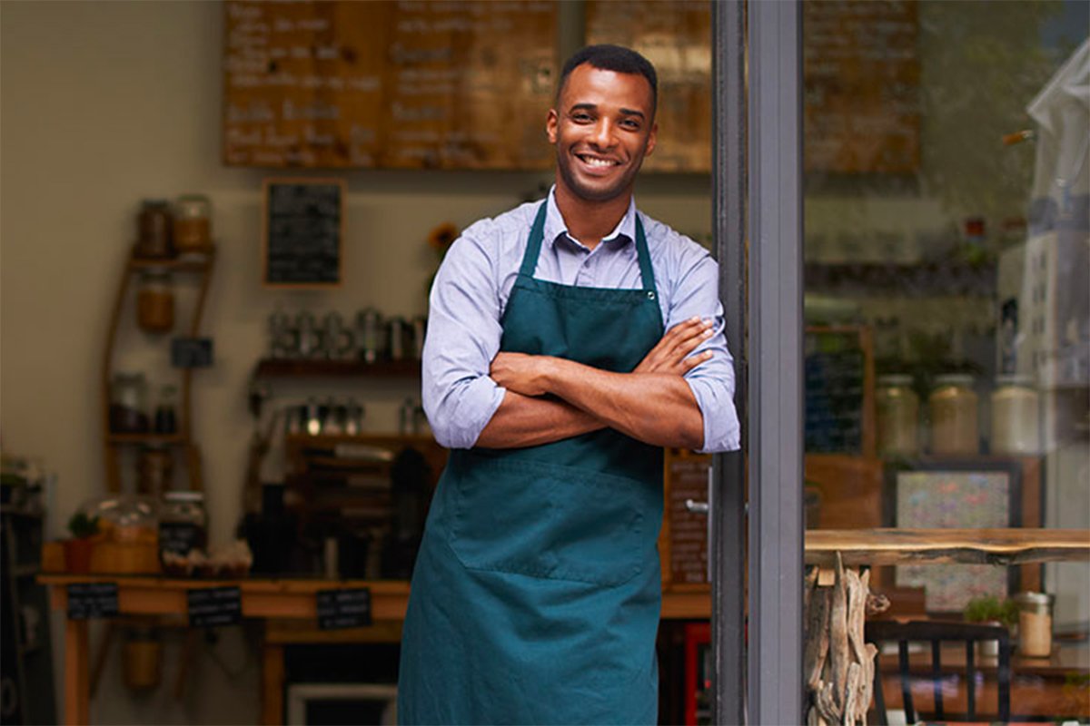 Business owner in doorway